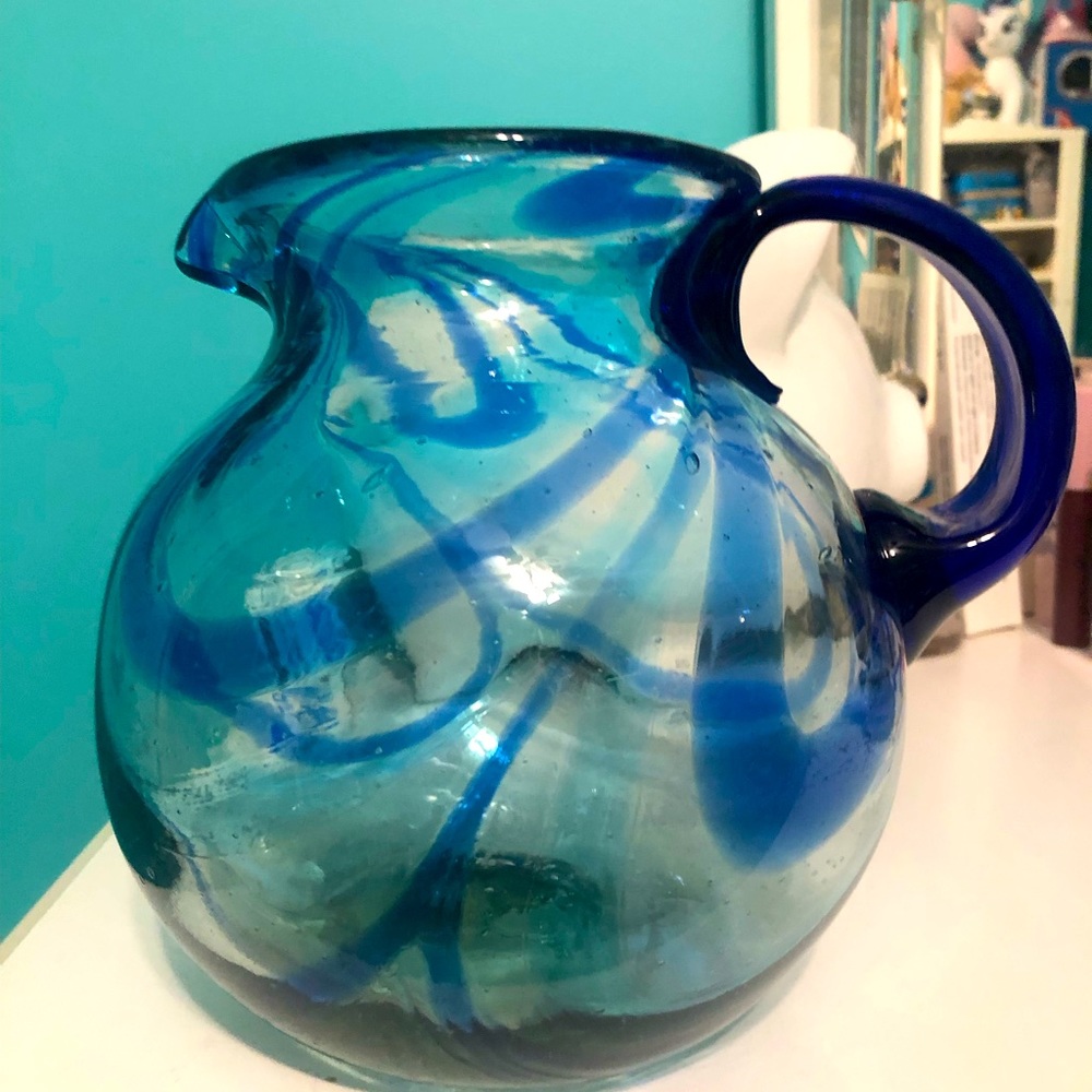 Large hand blown glass pitcher